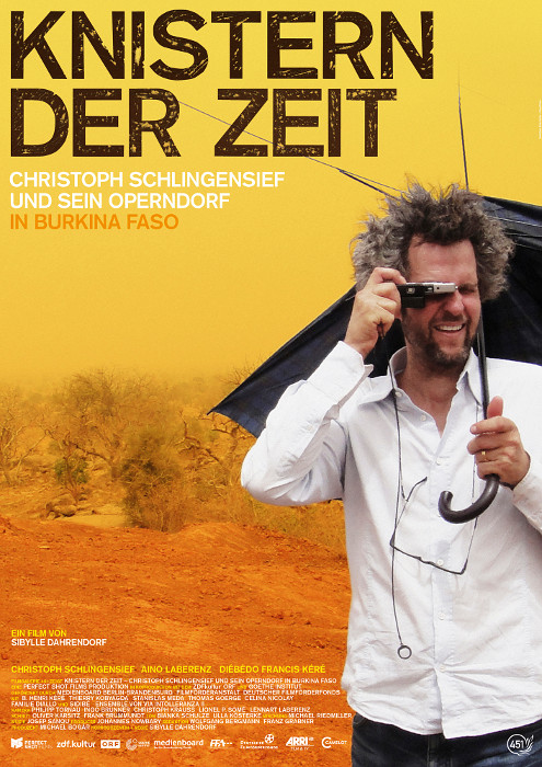 Plakat zum Film: Knistern der Zeit - Christoph Schlingensief und sein Operndorf in Burk