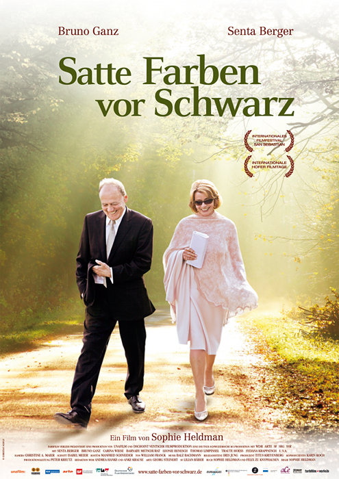 Plakat zum Film: Satte Farben vor Schwarz